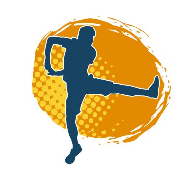 Hareket halindeki bir erkek dansçının silueti. Dans eden zayıf bir adamın silueti..