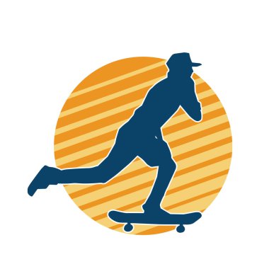 Hareket halindeki bir erkek silueti kaykay üzerinde poz veriyor. Kaykaylı bir şehir çocuğunun silueti..