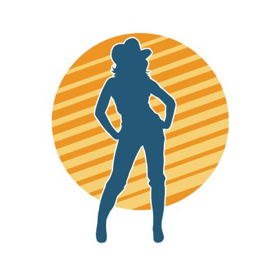 Kovboy kostümü giymiş bir kadın modelin silueti. Poz vermiş bir kovboy kızın silueti..