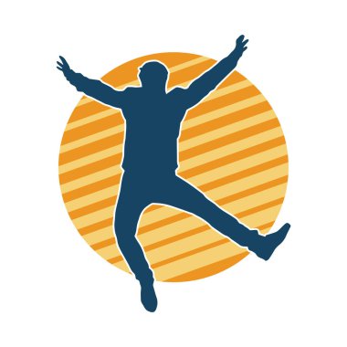 Hareket halindeki bir erkek dansçının silueti. Dans eden zayıf bir adamın silueti..