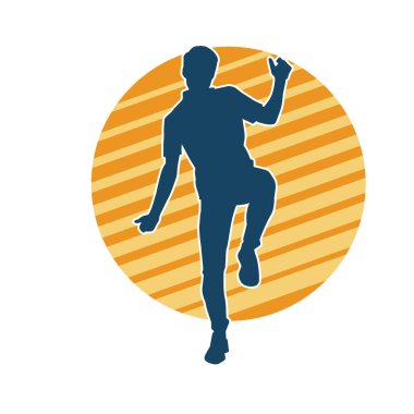 Hareket halindeki bir erkek dansçının silueti. Dans eden zayıf bir adamın silueti..