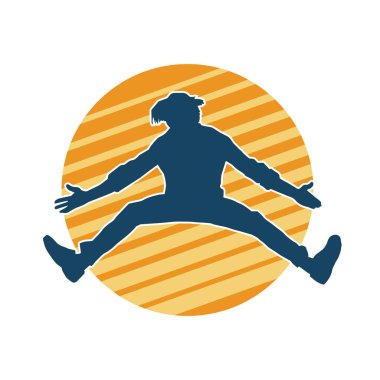 Hareket halindeki bir erkek dansçının silueti. Dans eden zayıf bir adamın silueti..