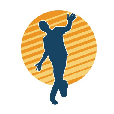 Hareket halindeki bir erkek dansçının silueti. Dans eden zayıf bir adamın silueti..