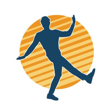 Hareket halindeki bir erkek dansçının silueti. Dans eden zayıf bir adamın silueti..