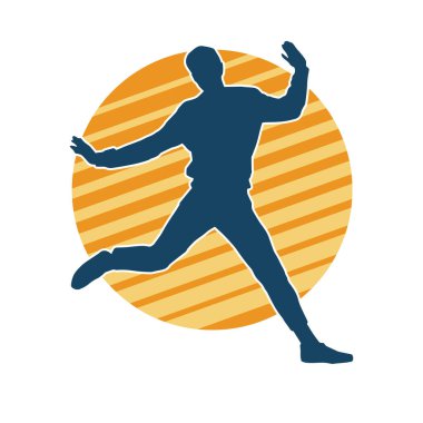 Hareket halindeki bir erkek dansçının silueti. Dans eden zayıf bir adamın silueti..