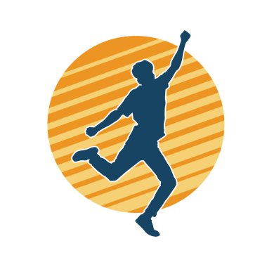 Hareket halindeki bir erkek dansçının silueti. Dans eden zayıf bir adamın silueti..