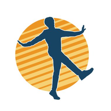 Hareket halindeki bir erkek dansçının silueti. Dans eden zayıf bir adamın silueti..