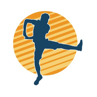 Hareket halindeki bir erkek dansçının silueti. Dans eden zayıf bir adamın silueti..