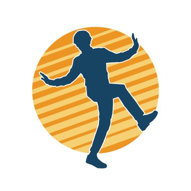 Hareket halindeki bir erkek dansçının silueti. Dans eden zayıf bir adamın silueti..