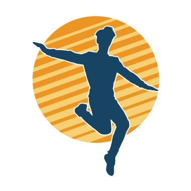 Hareket halindeki bir erkek dansçının silueti. Dans eden zayıf bir adamın silueti..