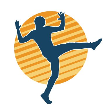 Hareket halindeki bir erkek dansçının silueti. Dans eden zayıf bir adamın silueti..