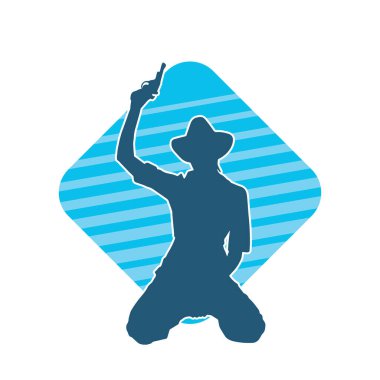 Kovboy kostümü giymiş bir kadın modelin silueti. Silah taşıyan bir kovboy kız silueti..