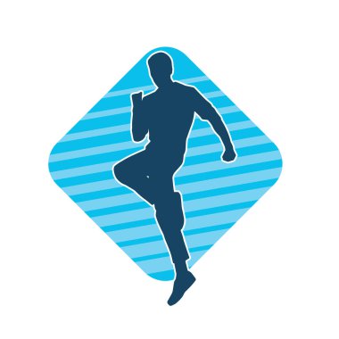 Hareket halindeki bir erkek dansçının silueti. Dans eden zayıf bir adamın silueti..