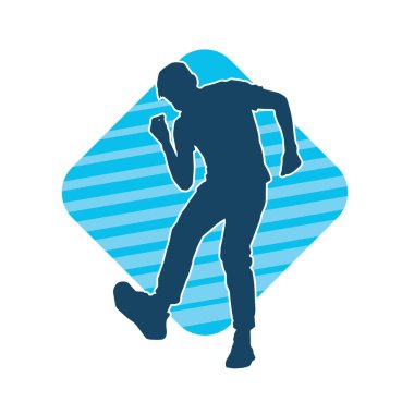 Hareket halindeki bir erkek dansçının silueti. Dans eden zayıf bir adamın silueti..