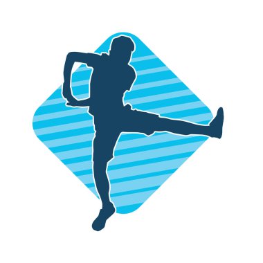 Hareket halindeki bir erkek dansçının silueti. Dans eden zayıf bir adamın silueti..