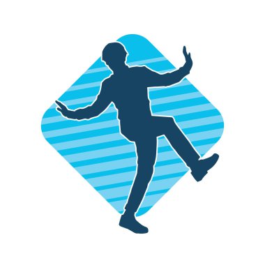 Hareket halindeki bir erkek dansçının silueti. Dans eden zayıf bir adamın silueti..