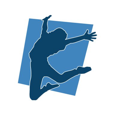 Genç bir kızın silueti atlama pozu. Zıplayan genç bir kadının silueti..