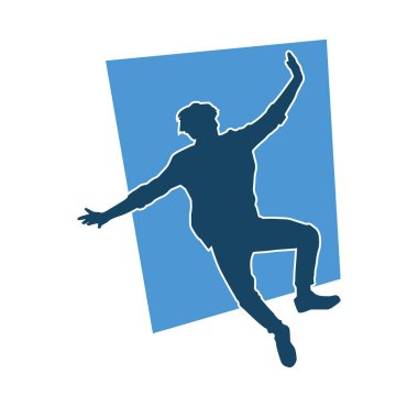 Hareket halindeki bir erkek dansçının silueti. Dans eden zayıf bir adamın silueti..