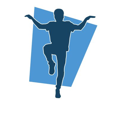 Hareket halindeki bir erkek dansçının silueti. Dans eden zayıf bir adamın silueti..