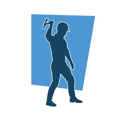 Hareket halindeki bir işçinin silueti, baltasını kullanarak poz verir..