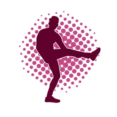 Hareket halindeki bir erkek dansçının silueti. Dans eden zayıf bir adamın silueti..