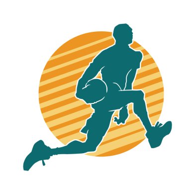 Hareketli bir erkek basketbolcunun silueti. Basketbol oynayan bir adamın silüeti..