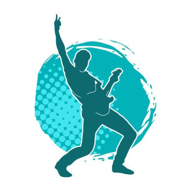 Elektro gitar çalan bir müzisyenin silueti. Bir erkek gitaristin silueti.