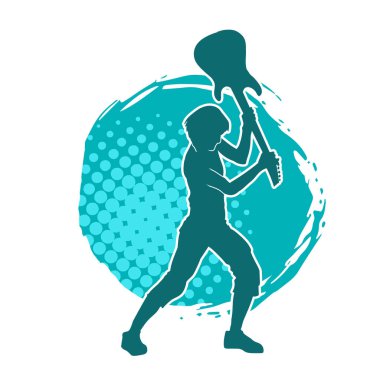 Elektro gitarı parçalayan bir rock müzisyeninin silueti..