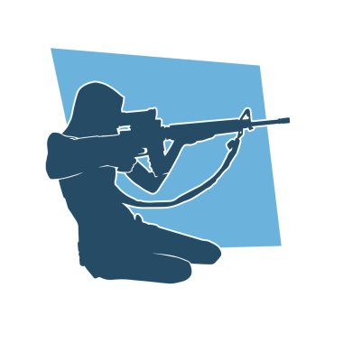 Makineli tüfek taşıyan bir kadın savaşçının silueti.