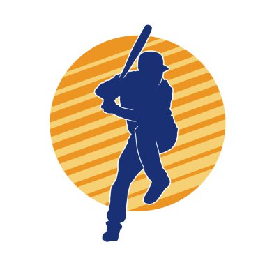Hareketli bir erkek beyzbol oyuncusunun silueti. Vurucu olarak beyzbol oynayan bir adamın silueti..