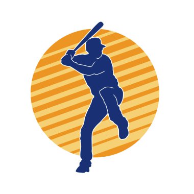 Hareketli bir erkek beyzbol oyuncusunun silueti. Vurucu olarak beyzbol oynayan bir adamın silueti..