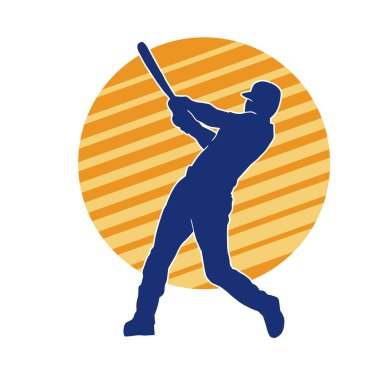 Hareketli bir erkek beyzbol oyuncusunun silueti. Vurucu olarak beyzbol oynayan bir adamın silueti..