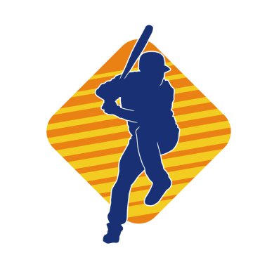 Hareketli bir erkek beyzbol oyuncusunun silueti. Vurucu olarak beyzbol oynayan bir adamın silueti..
