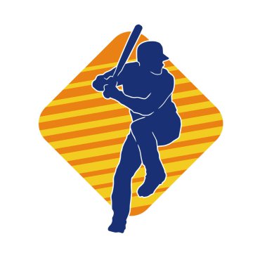 Hareketli bir erkek beyzbol oyuncusunun silueti. Vurucu olarak beyzbol oynayan bir adamın silueti..
