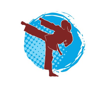 Dövüş sanatları tekmesi atan bir kadının silueti. Sportif bir kadının silueti tekme hareketi yapıyor..