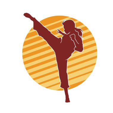 Dövüş sanatları tekmesi atan bir kadının silueti. Sportif bir kadının silueti tekme hareketi yapıyor..