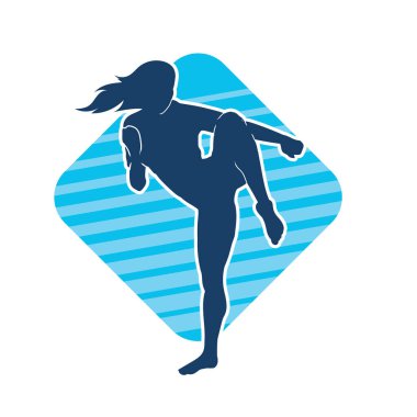 Tekmeleyen bir kadının silueti. Hareket halindeki bir kadın dövüş sanatının silüeti..