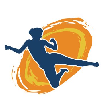 Dövüş sanatları tekmesi atan bir kadının silueti. Sportif bir kadının silueti tekme hareketi yapıyor..