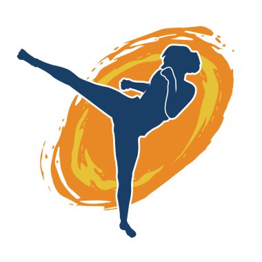 Dövüş sanatları tekmesi atan bir kadının silueti. Sportif bir kadının silueti tekme hareketi yapıyor..