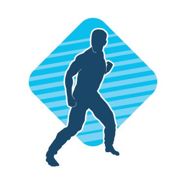 Doğu dövüş sanatı pozu veren bir adamın silueti. Dövüş sanatlarında bir erkeğin silueti..