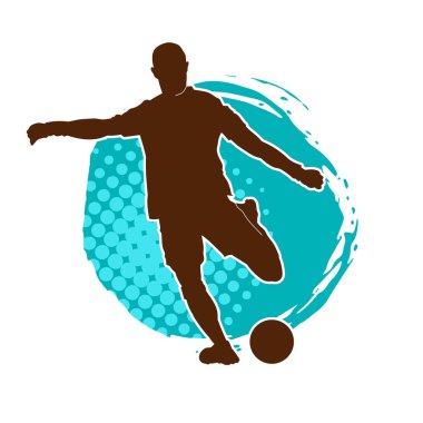 Top tekmeleyen bir erkek futbolcunun silueti. Hareket halindeki bir futbolcunun silueti.