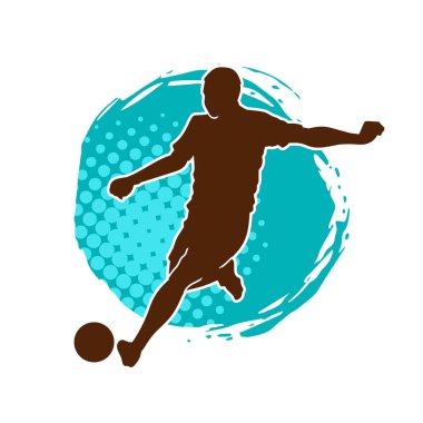 Top tekmeleyen bir erkek futbolcunun silueti. Hareket halindeki bir futbolcunun silueti.