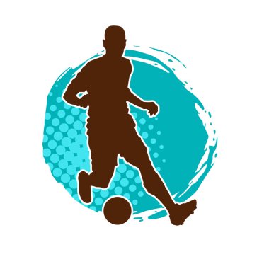 Futbol oynayan bir adamın silüeti. Hareket halindeki bir futbolcunun silueti.