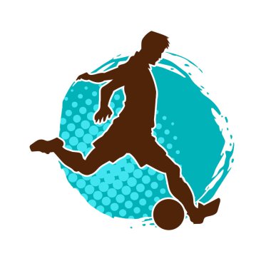 Futbol oynayan bir adamın silüeti. Hareket halindeki bir futbolcunun silueti.