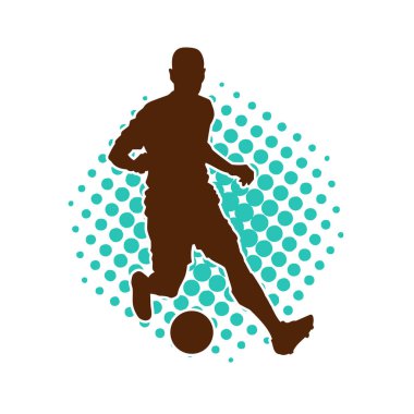 Futbol oynayan bir adamın silüeti. Hareket halindeki bir futbolcunun silueti.
