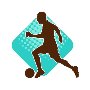 Futbol oynayan bir adamın silüeti. Hareket halindeki bir futbolcunun silueti.