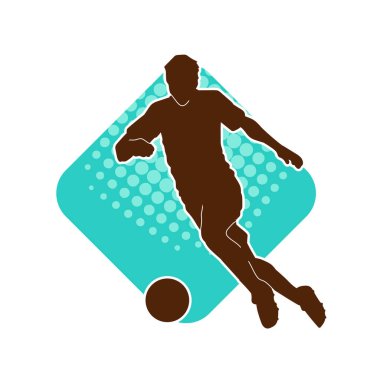 Futbol oynayan bir adamın silüeti. Hareket halindeki bir futbolcunun silueti.