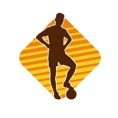 Top tekmeleyen bir erkek futbolcunun silueti. Hareket halindeki bir futbolcunun silueti.