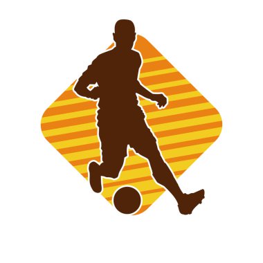 Top tekmeleyen bir erkek futbolcunun silueti. Hareket halindeki bir futbolcunun silueti.
