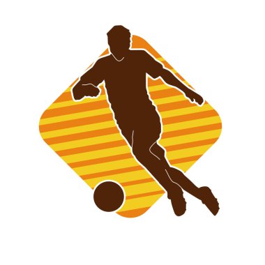 Top tekmeleyen bir erkek futbolcunun silueti. Hareket halindeki bir futbolcunun silueti.